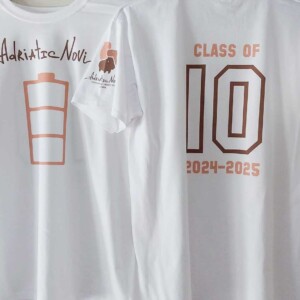 Two T-shirts for the tenth grade of the Adriatic Novi school. Front and back sides. 2025. Two T-shirts of the tenth grade of the Adriatic Novi school, hanging with the front and back sides. 2025.